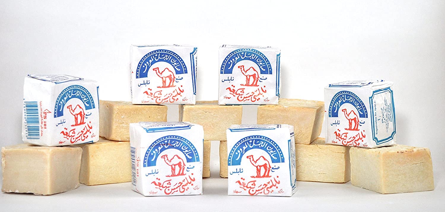 Al-Jamal Holy Land origin soap closeup highlights authentic heritage and natural ingredients.