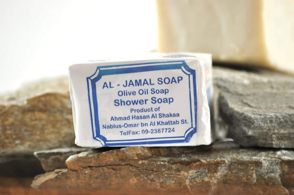 Al-Jamal soap on tray presentation conveys simple, pure skin care ritual.