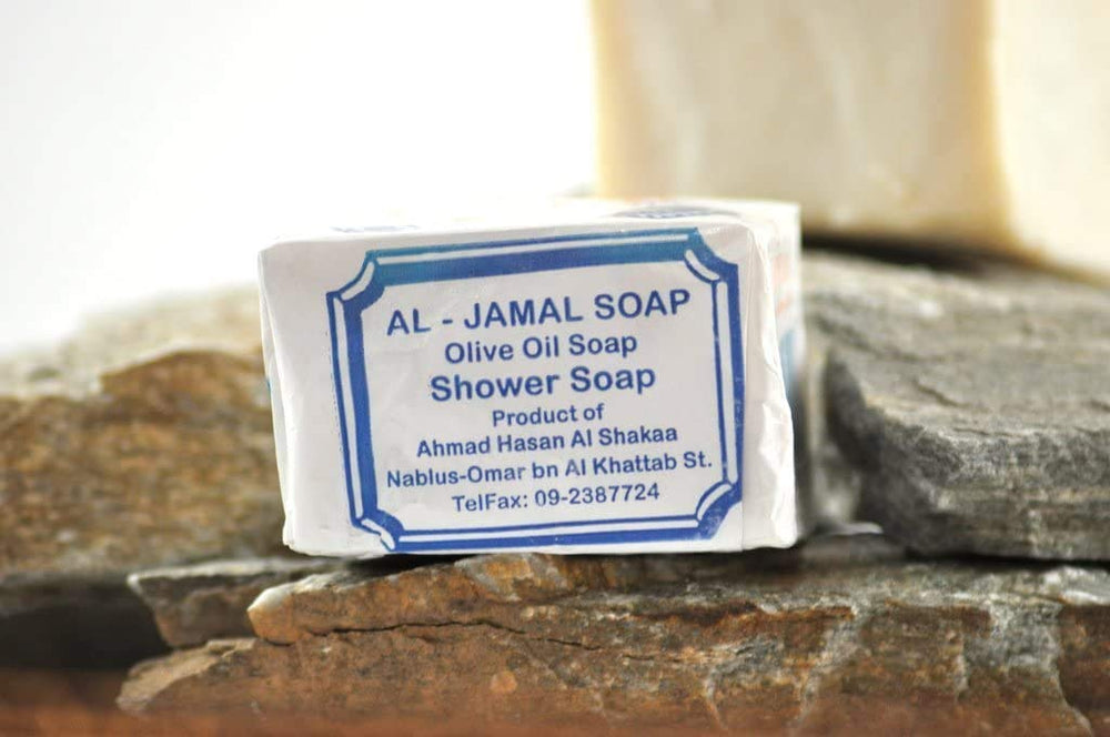 Al-Jamal soap on tray presentation conveys simple, pure skin care ritual.