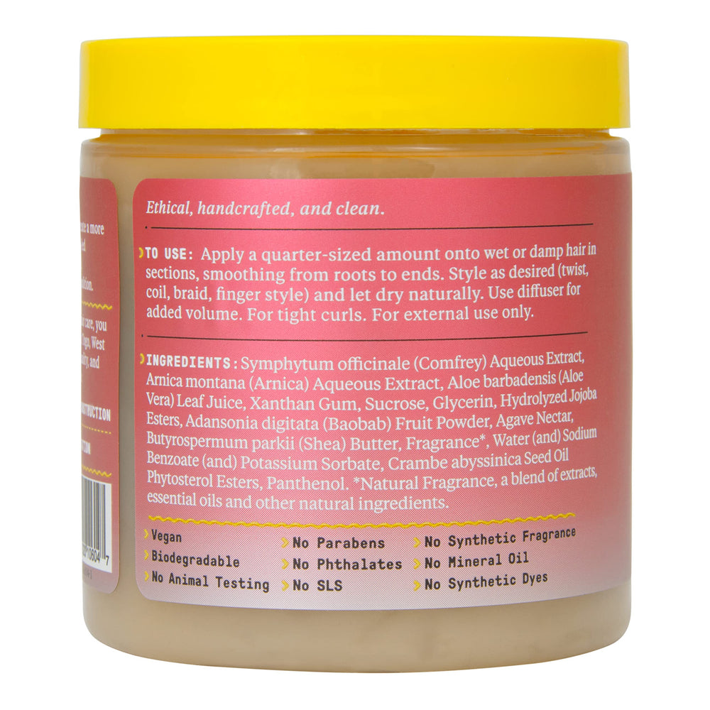Alaffia Beautiful Curls Curl Custard being applied to wet hair for defined styling.