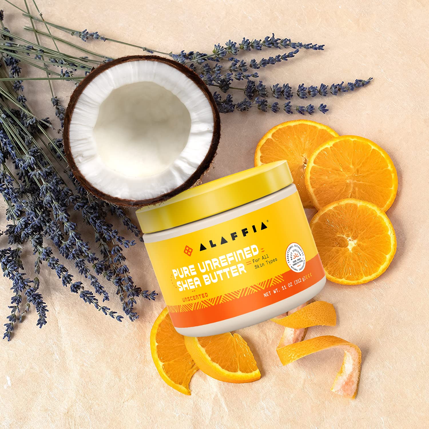 Alaffia Unscented 11 oz jar next to face shows facial hydration potential