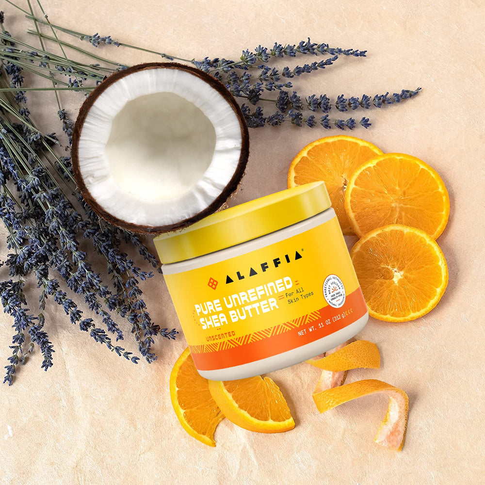 Alaffia Unscented 11 oz jar next to face shows facial hydration potential