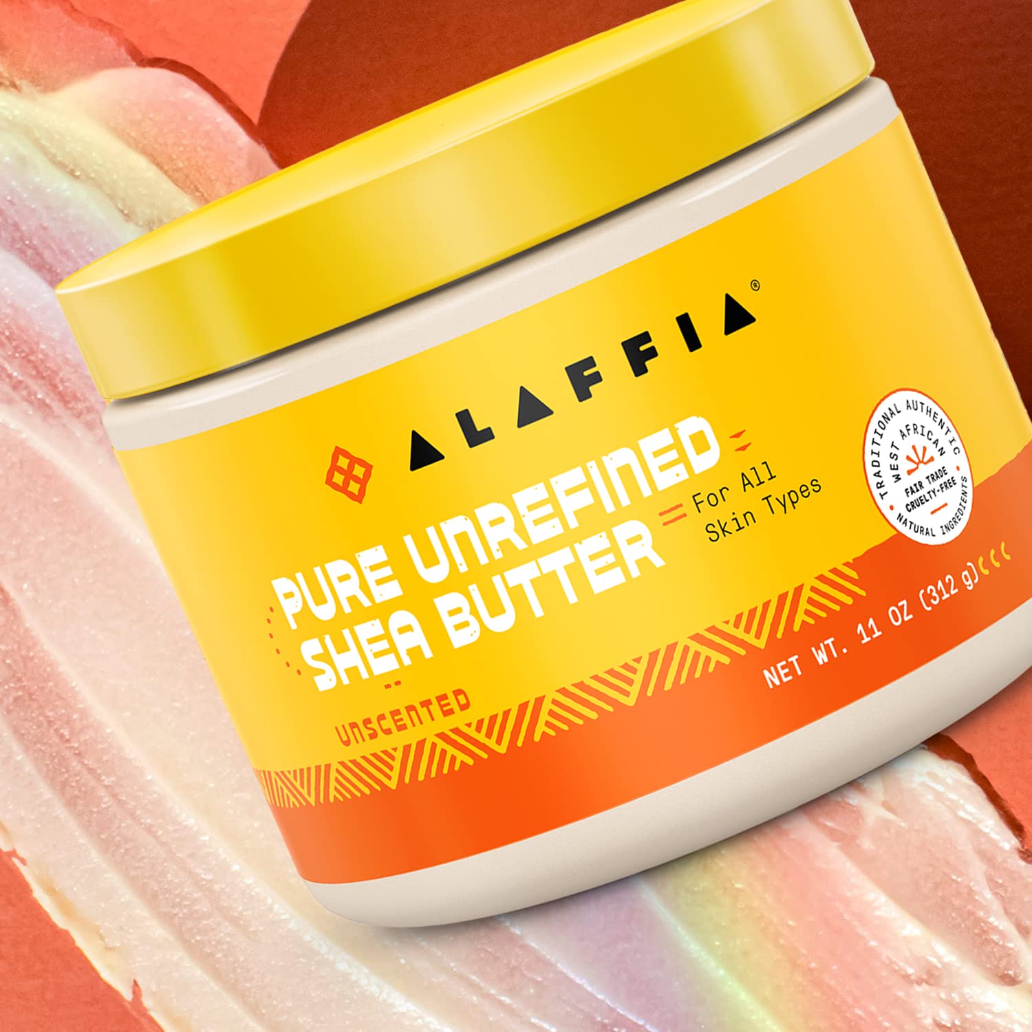 Alaffia Shea Butter Unscented 11 oz in hand demonstrates hair moisture and shine application
