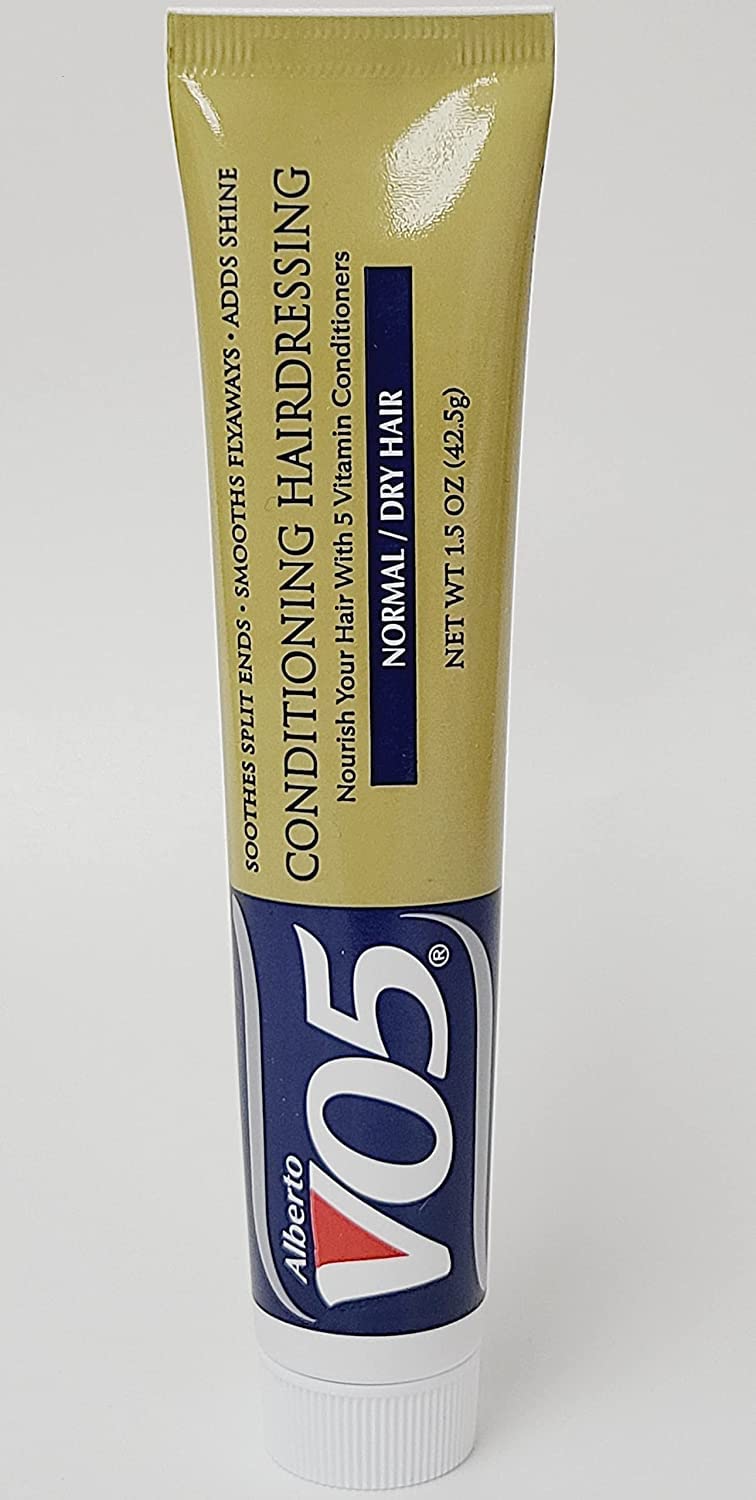 Alberto VO5 Conditioning Hairdressing demonstrates color-safe formula protecting vibrancy.