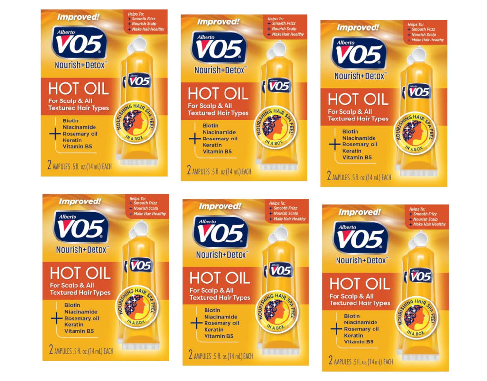Alberto VO5 Hot Oil Therapy bottle closeup emphasizes rich 5-vitamin 5-protein formula.