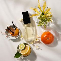 ALFRED SUNG Sung EDT citrus and floral notes in a close-up shot.