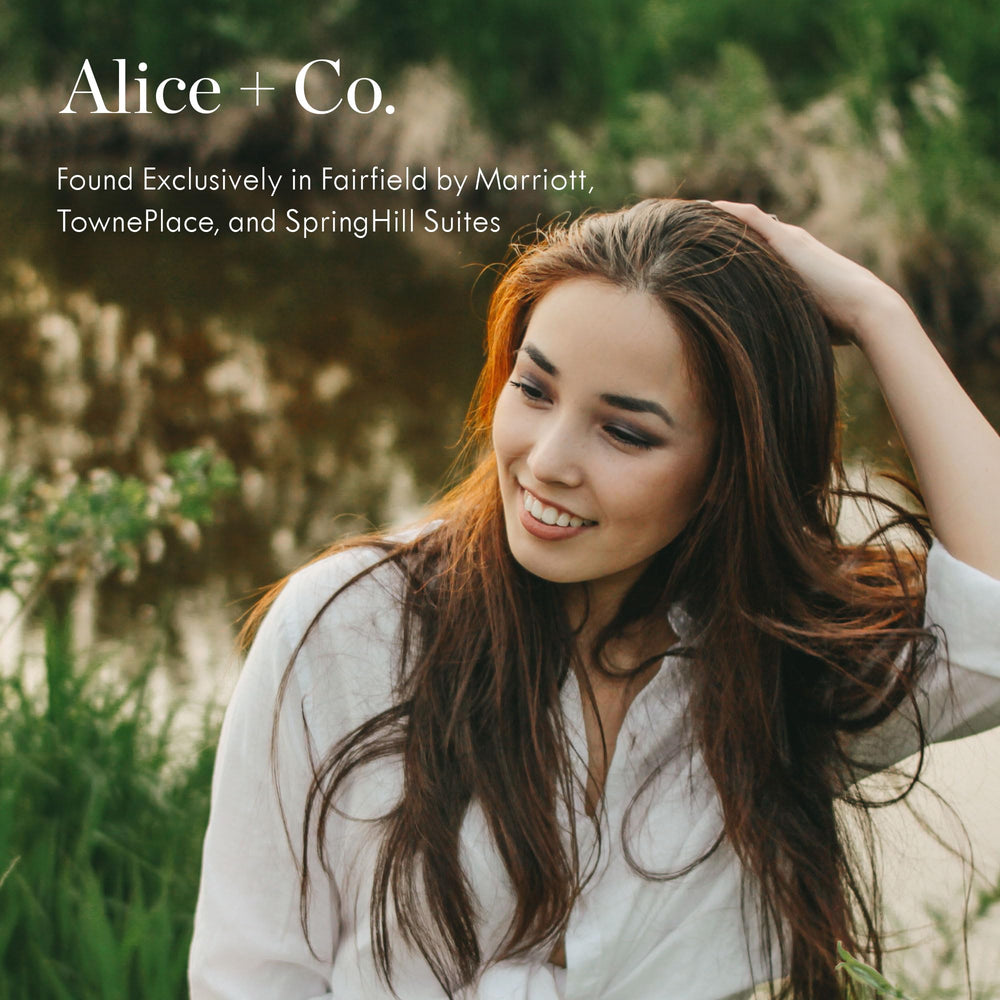 Alice + Co. Shampoo and Conditioner set label closeup highlights hotel-grade branding and calming lavender aroma.