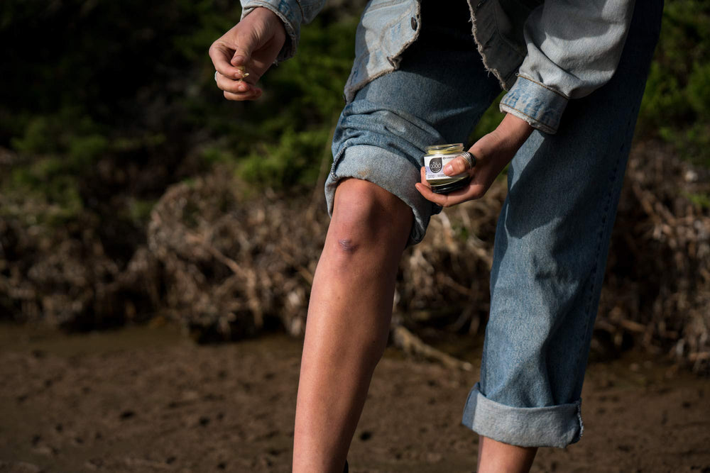 All Good Goop balm with olive oil showcases nourishing moisture for dry skin.