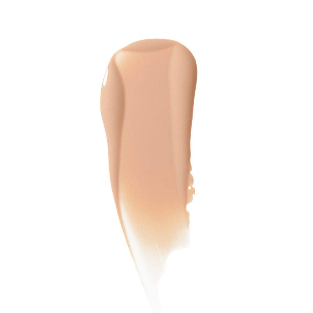 Almay liquid foundation application by finger blend for smooth, seamless finish.