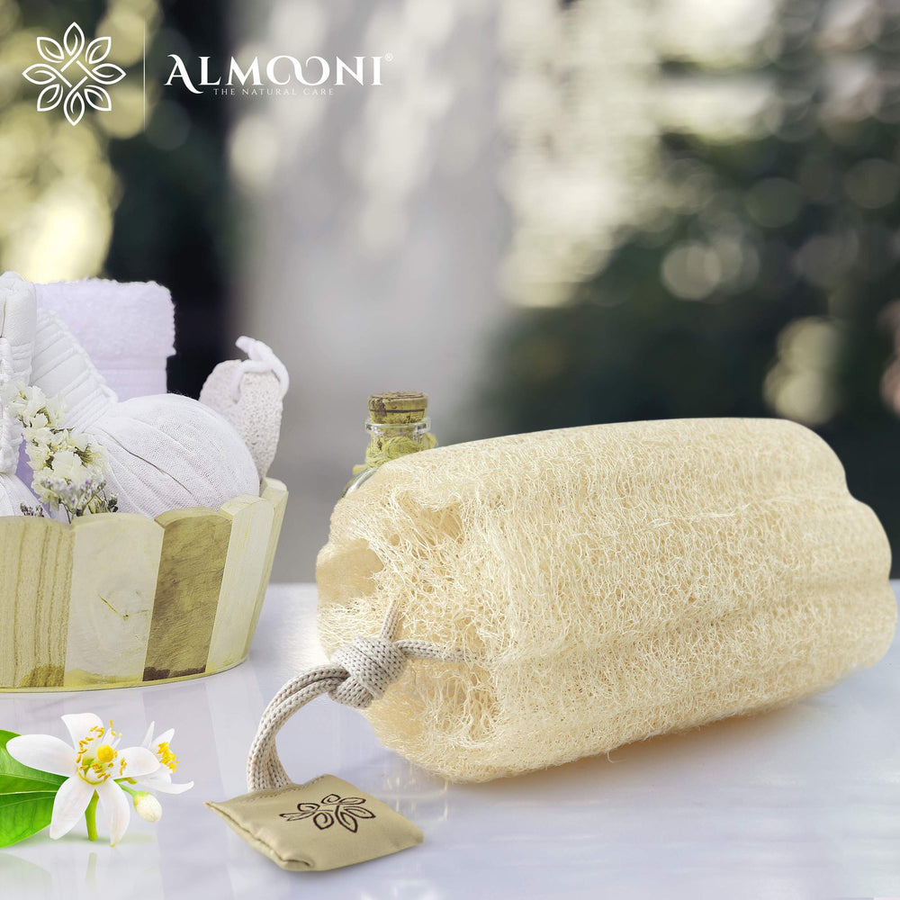 ALMOONI body scrubber in use on arm for cleansing exfoliation