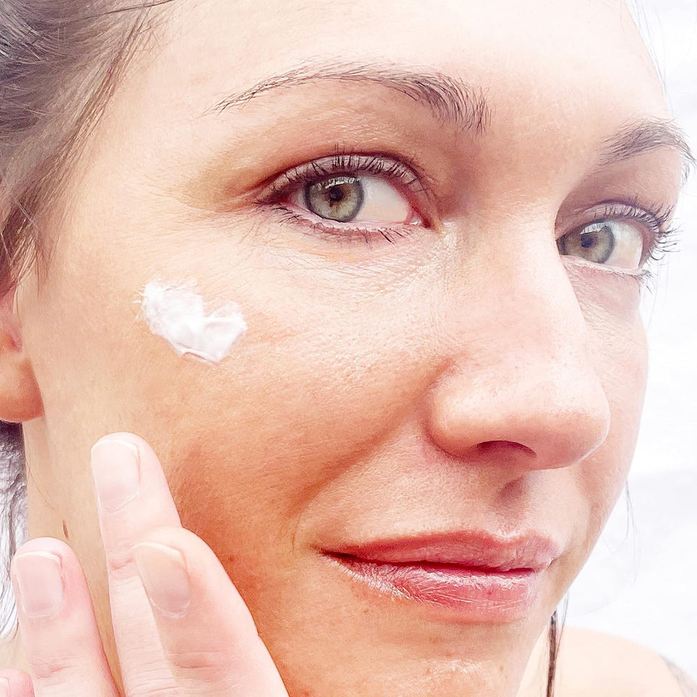Alpha Skin Care Enhanced Wrinkle Repair Cream jar close-up reveals creamy, nourishing texture