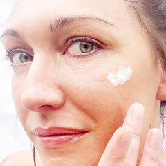 Alpha Skin Care Essential Renewal Lotion texture closeup shows a lightweight hydrator for normal to dry skin.