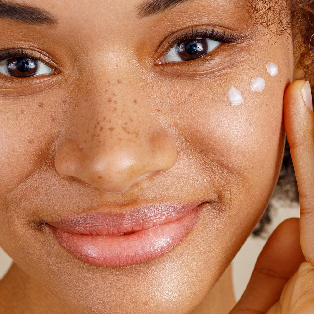 Alpha Skin Care Enhanced Renewal Cream texture swirl demonstrates gentle exfoliation with glycolic AHA.