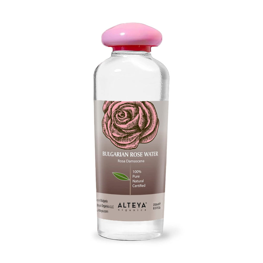 Alteya Rose Water bottle closeup, pure Rosa Damascena for facial toning.