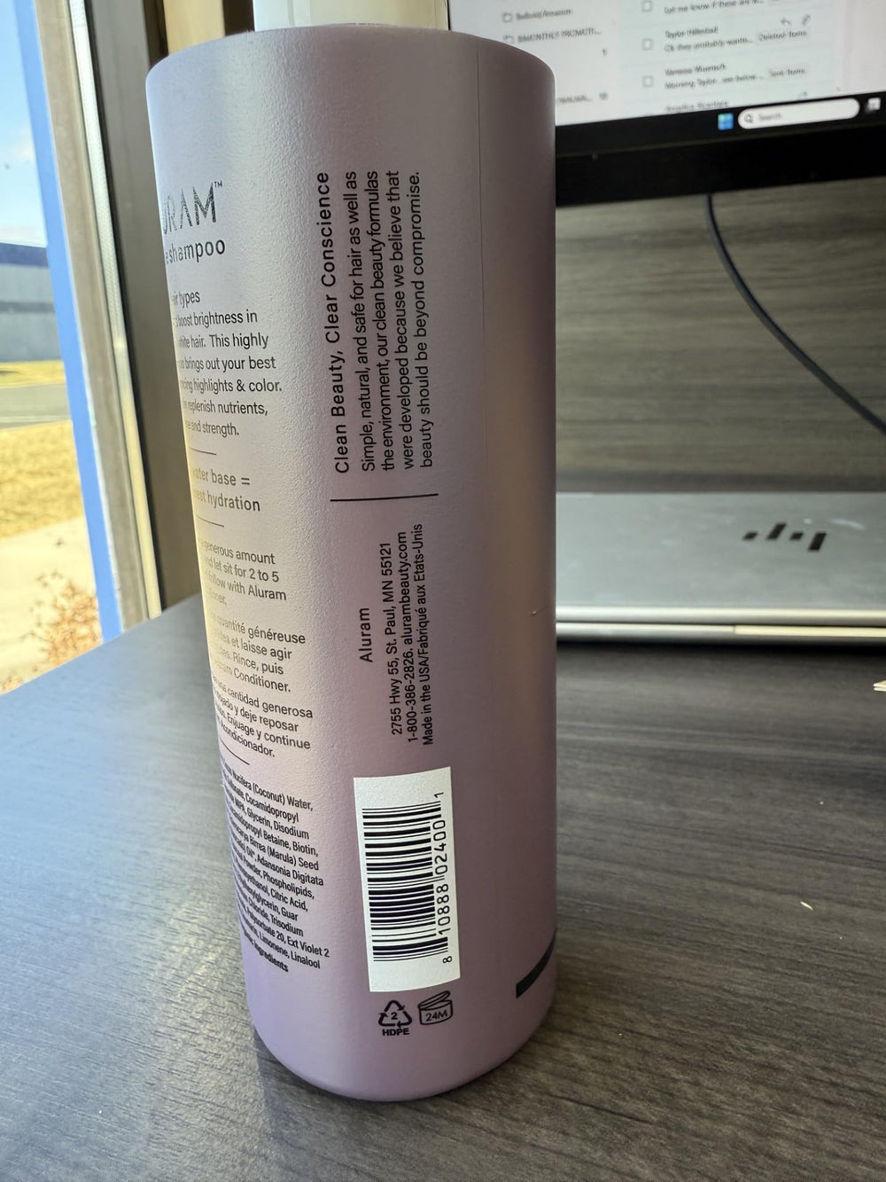 ALURAM Coconut Water Purple Shampoo bottle back shows ingredients list and usage directions for responsible care.