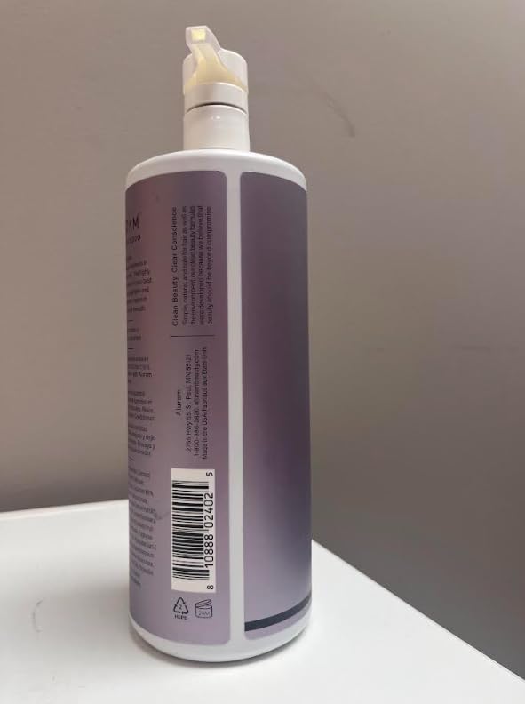 ALURAM Coconut Water Purple Shampoo ingredients-rose-hips closeup emphasizes nourishing color-treated hair.