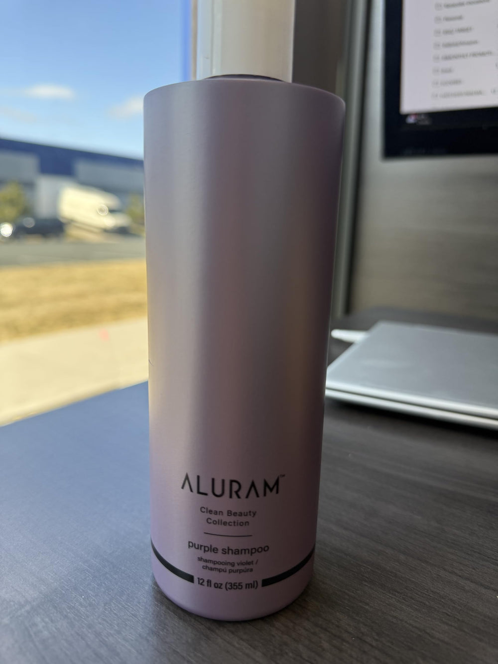 ALURAM Coconut Water Purple Shampoo lather on hand reveals rich hydration and detangling potential.