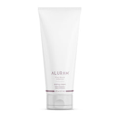 ALURAM coconut water styling cream bottle hydrates hair for a smoother finish