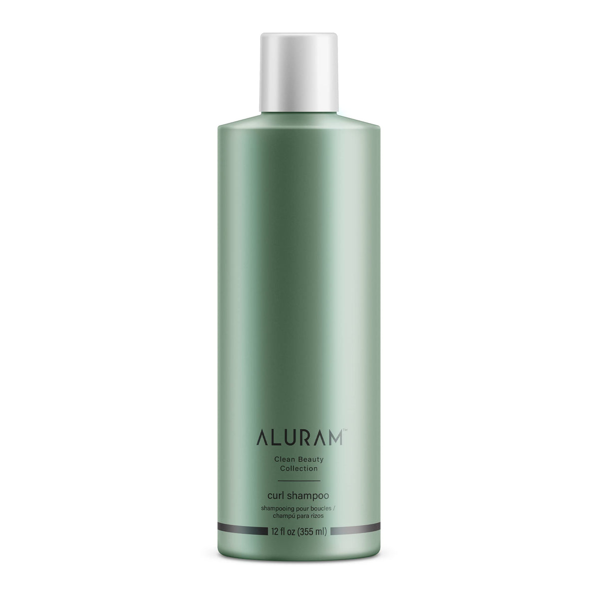 ALURAM Curl Shampoo bottle pour shows a hydrating cleanse for curls.