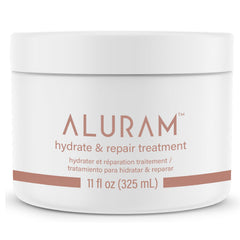ALURAM Hydrate & Repair bottle pour for deep hydration and revitalized hair.