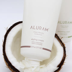 ALURAM styling cream application on hands for quick distribution across hair types