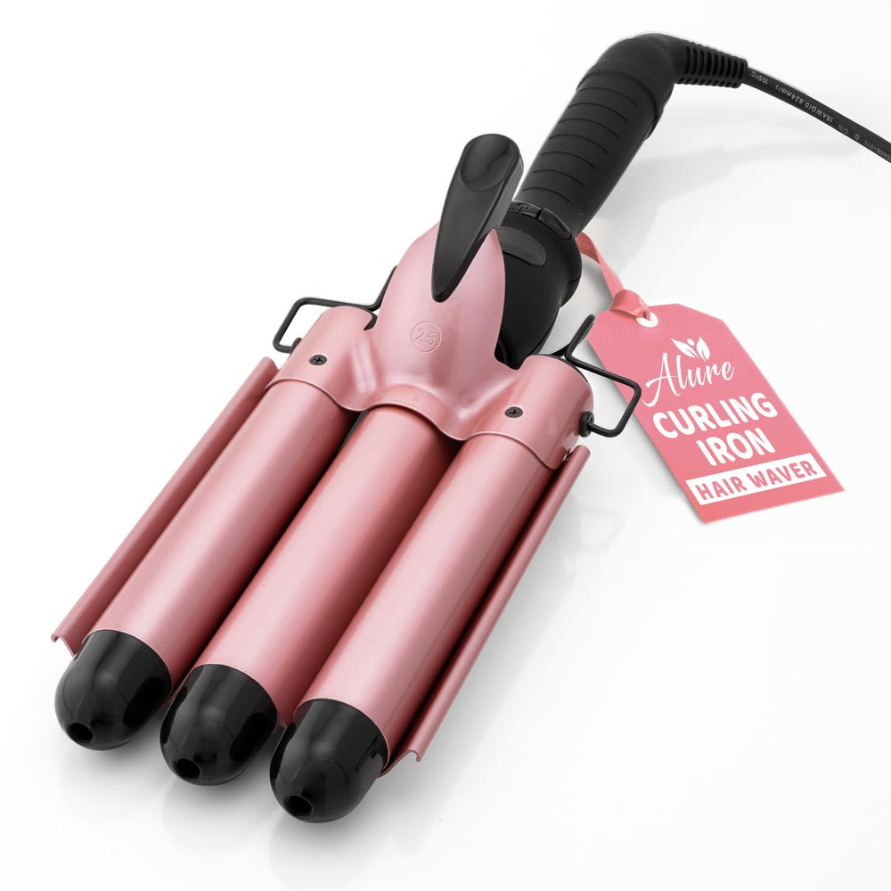 Alure three-barrel curling iron wand in rose gold close-up for fast beachy waves