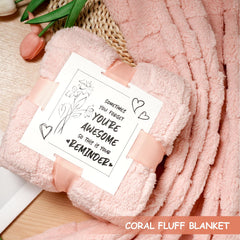 AmeLeis plush throw blanket provides cozy warmth for relaxing nights.