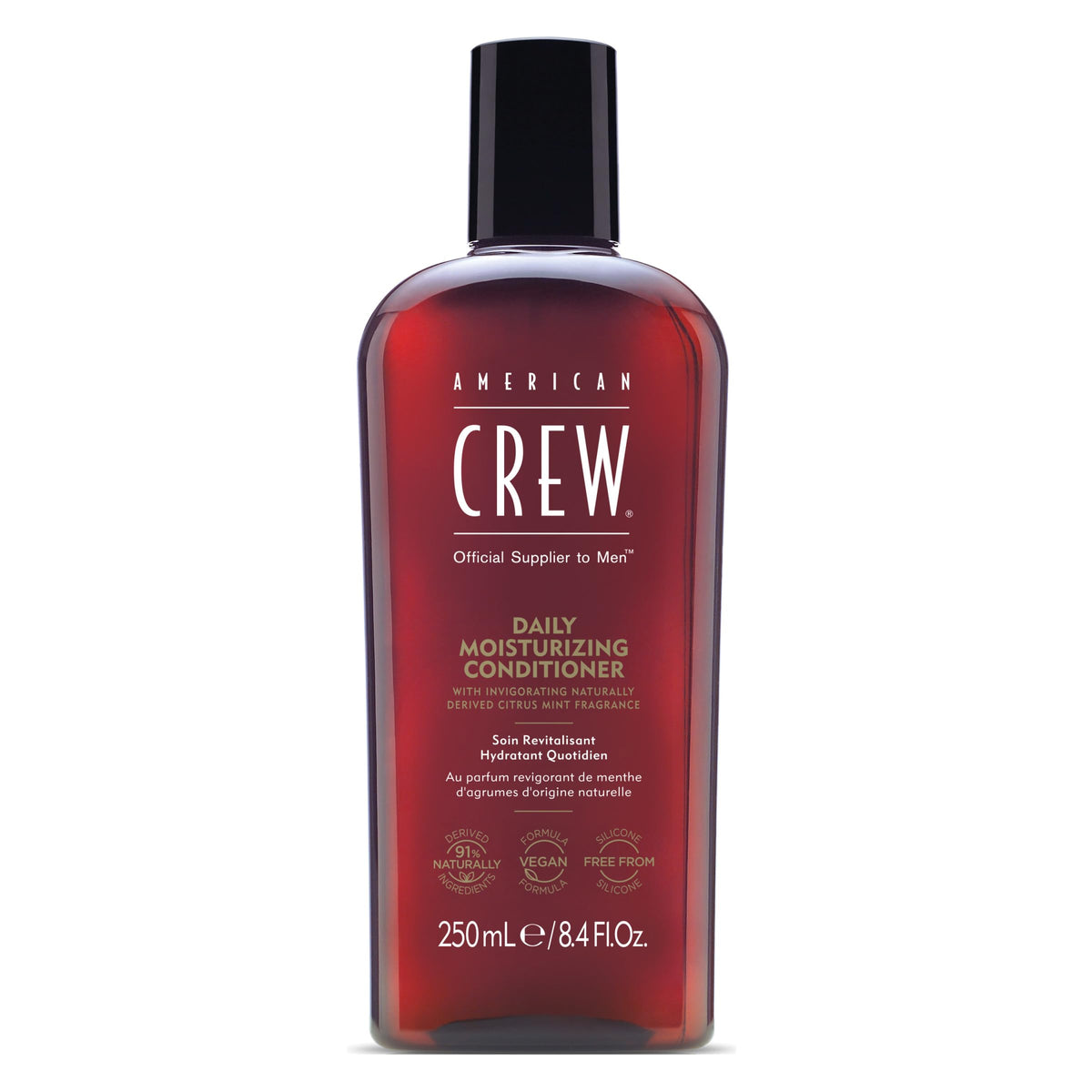 American Crew conditioner bottle pour with Citrus Mint fragrance for daily hydration.