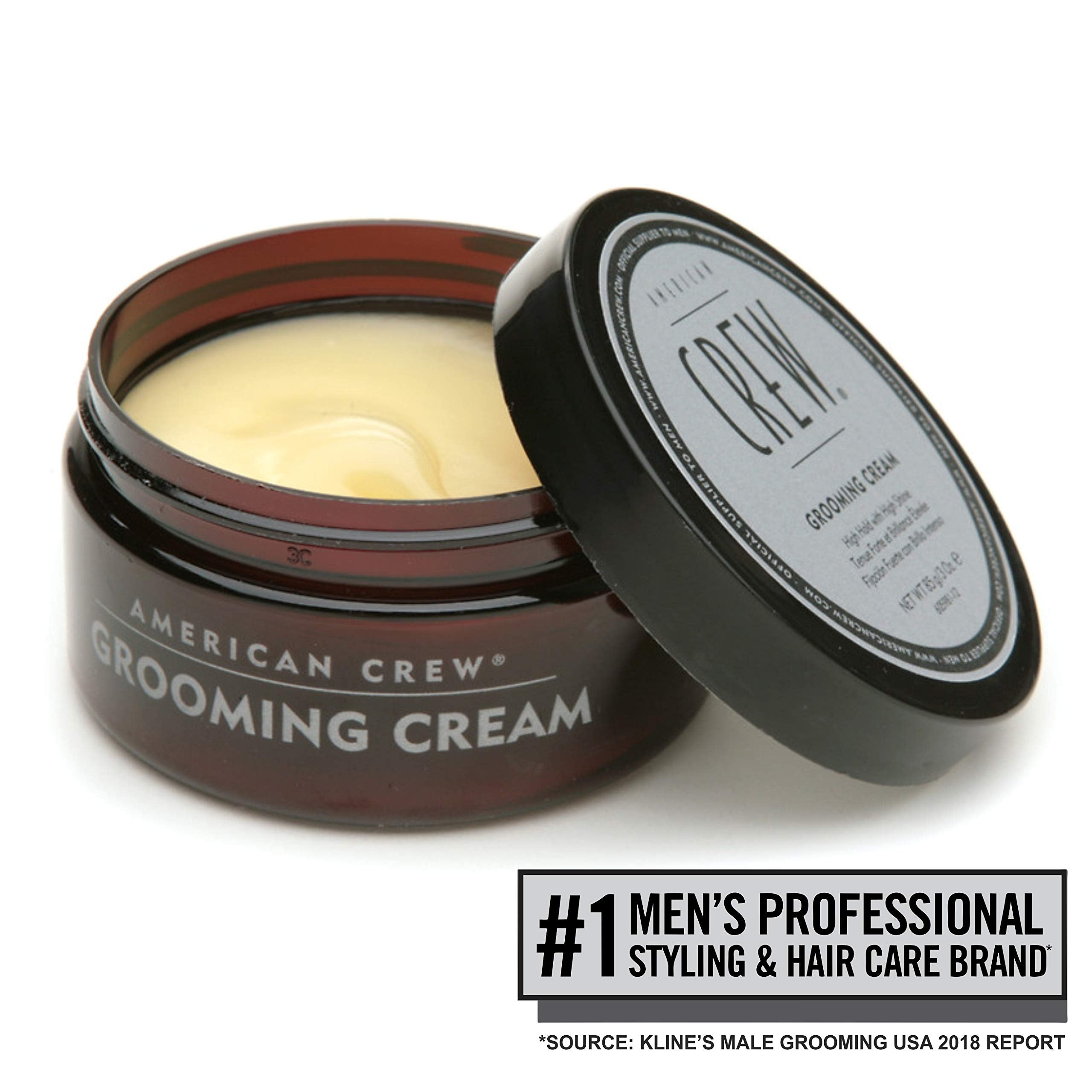 American Crew grooming cream being applied to towel-dried hair for style.