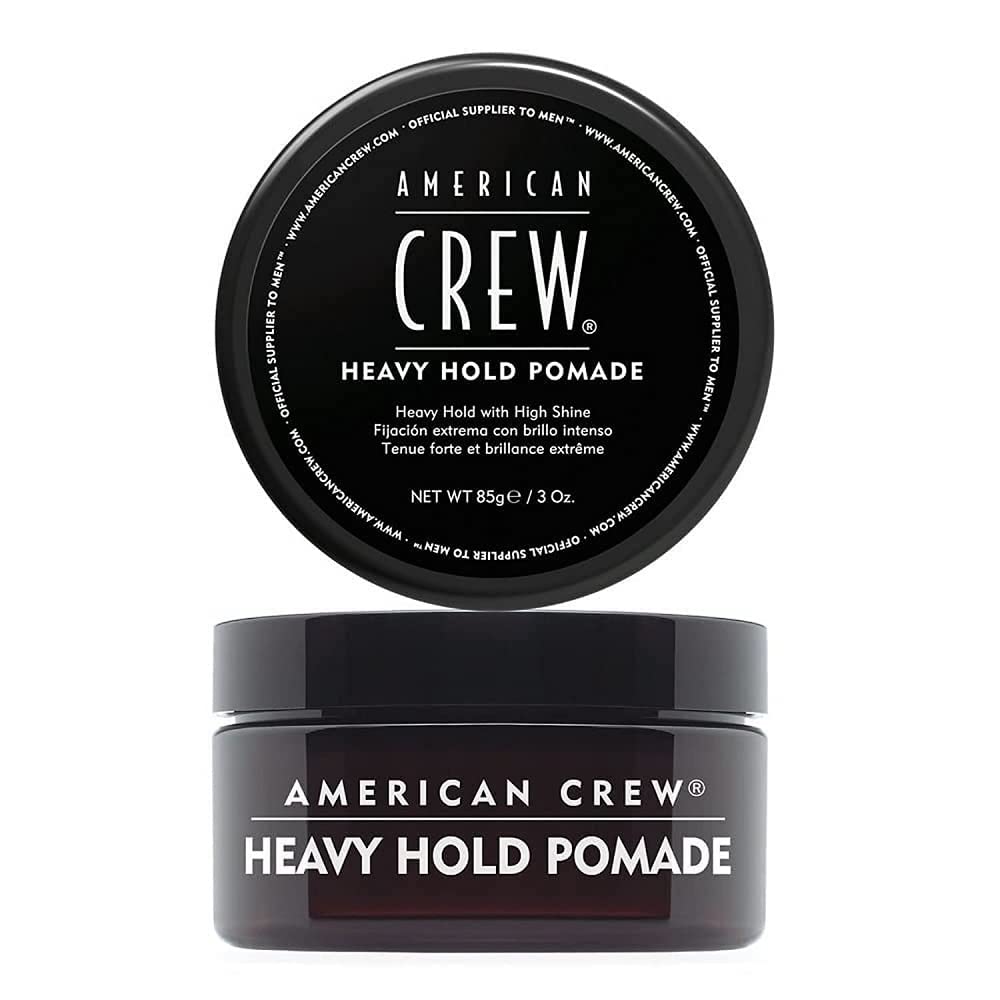 American Crew Hair Pomade old-version jar highlights heavy hold and high shine styling.