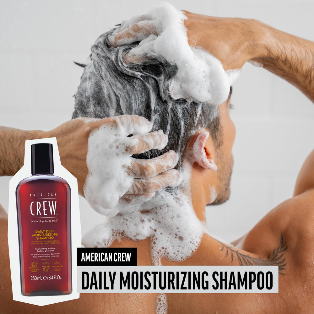 American Crew man grooming routine scene shows Citrus Mint fragrance energizing morning wash.