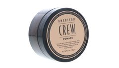American Crew Pomade 3oz jar texture close-up emphasizing creamy consistency for smooth application.