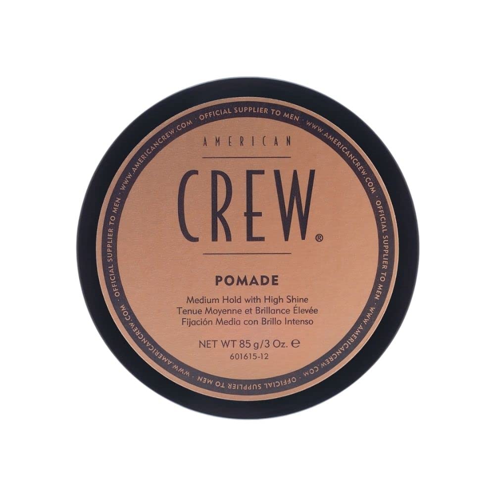 American Crew pomade 85g jar for hold and shine, ideal for slicked-back hairstyles.