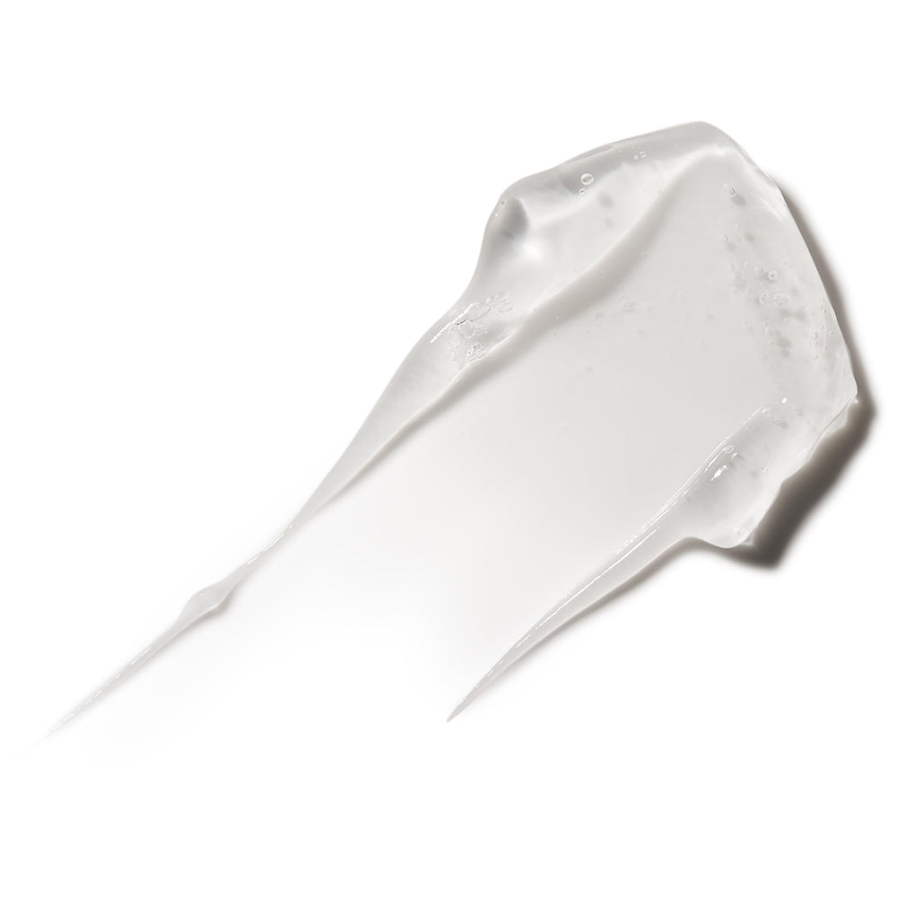 American Crew Shave Gel pour shows smooth glide for precise shaving.