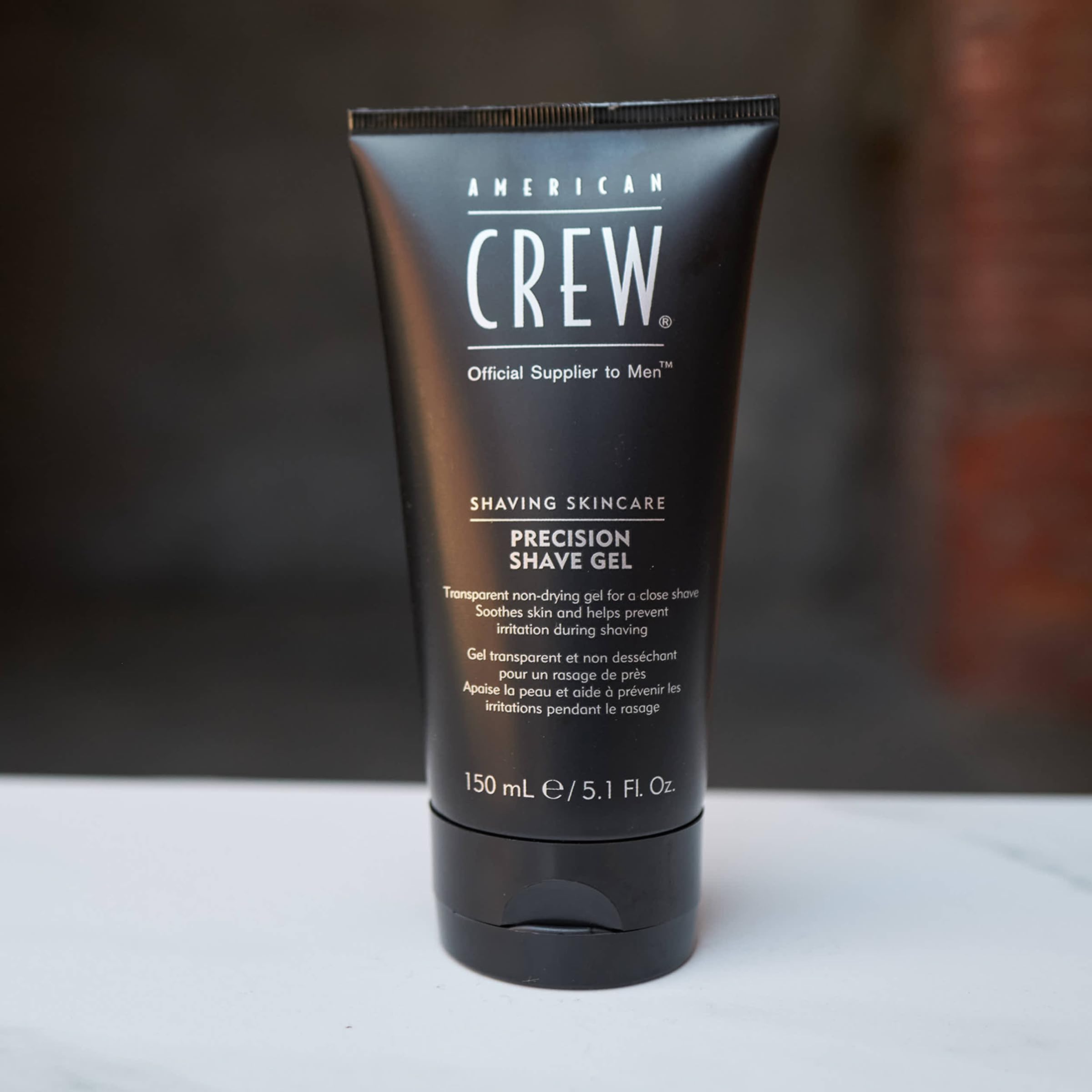 American Crew Shave Gel texture closeup hints soothing, irritation protection during shave.