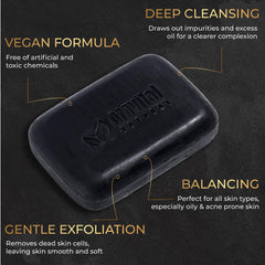 AMVital charcoal soap bar in use on face and body