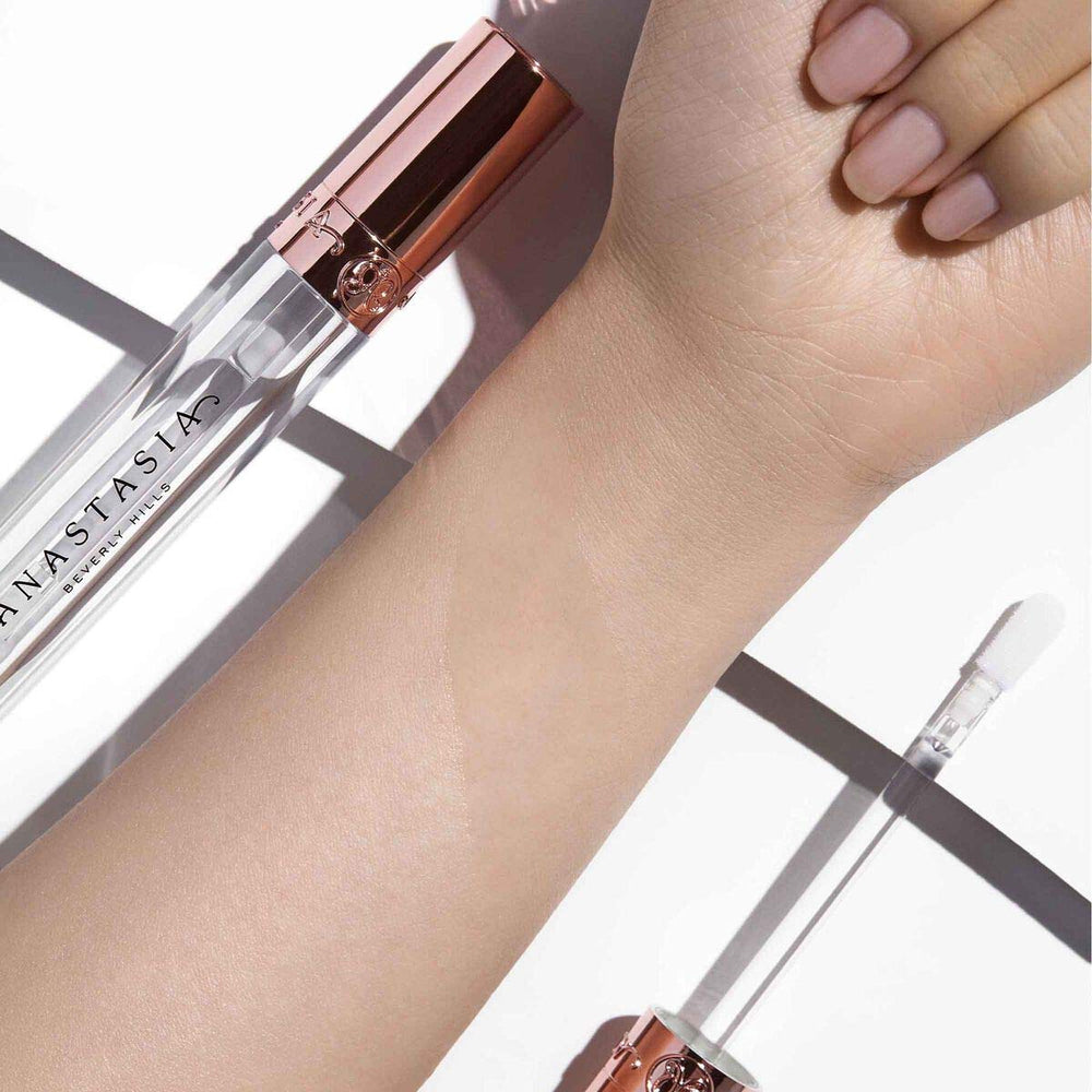 Anastasia Beverly Hills Crystal Gloss worn on lips with glass-like shine.