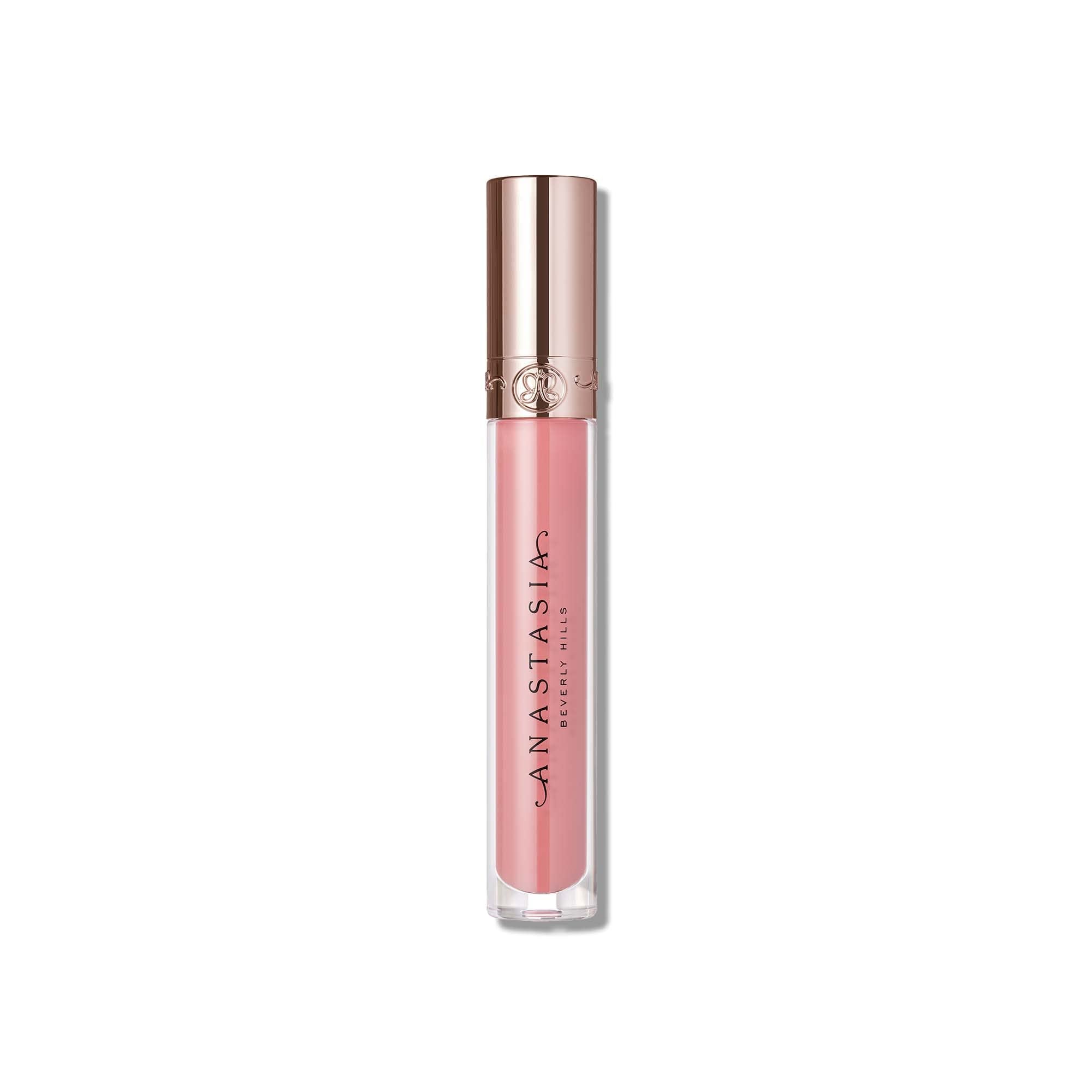 Anastasia Beverly Hills lip gloss Deep Taupe swatches on arm show luminous finish and color depth.