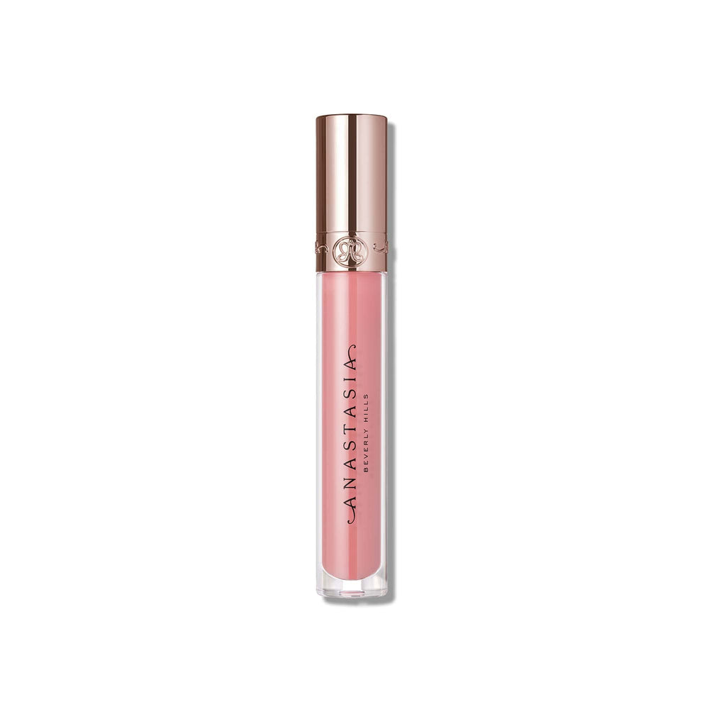 Anastasia Beverly Hills lip gloss Deep Taupe swatches on arm show luminous finish and color depth.