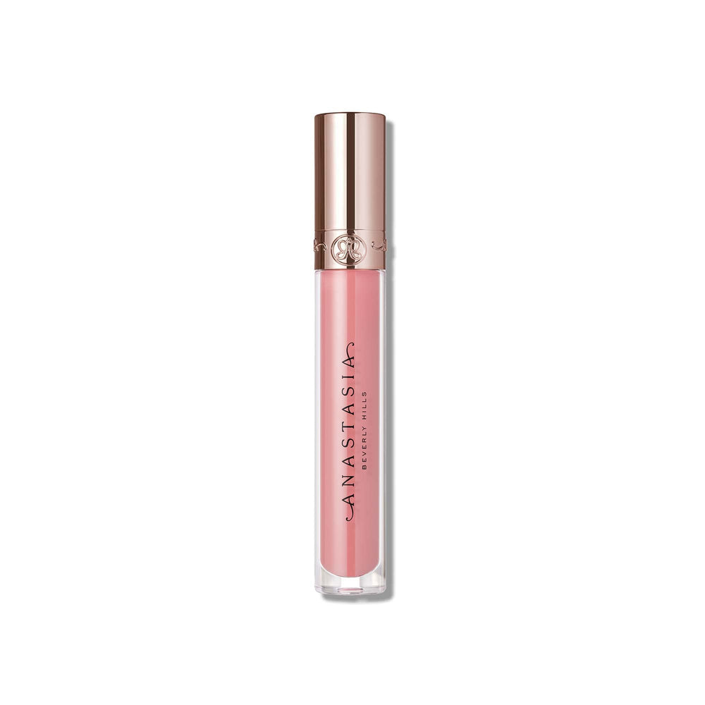 Anastasia Beverly Hills lip gloss wand applying soft pink sheen