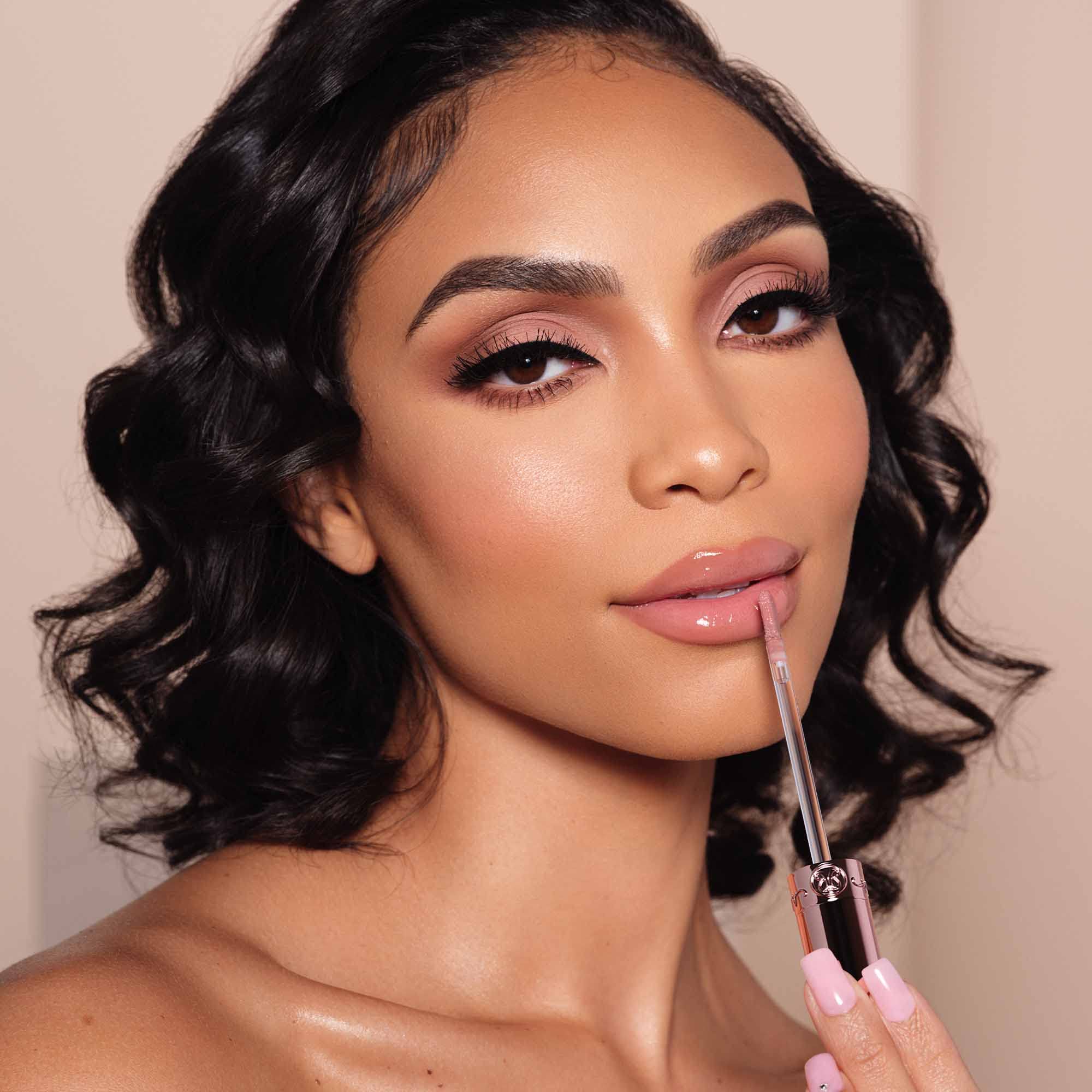 Anastasia Beverly Hills lip gloss ready to pair with liner for defined look