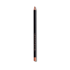 Anastasia Beverly Hills Lip Liner Hazelnut in-application on the lips for defined contours.