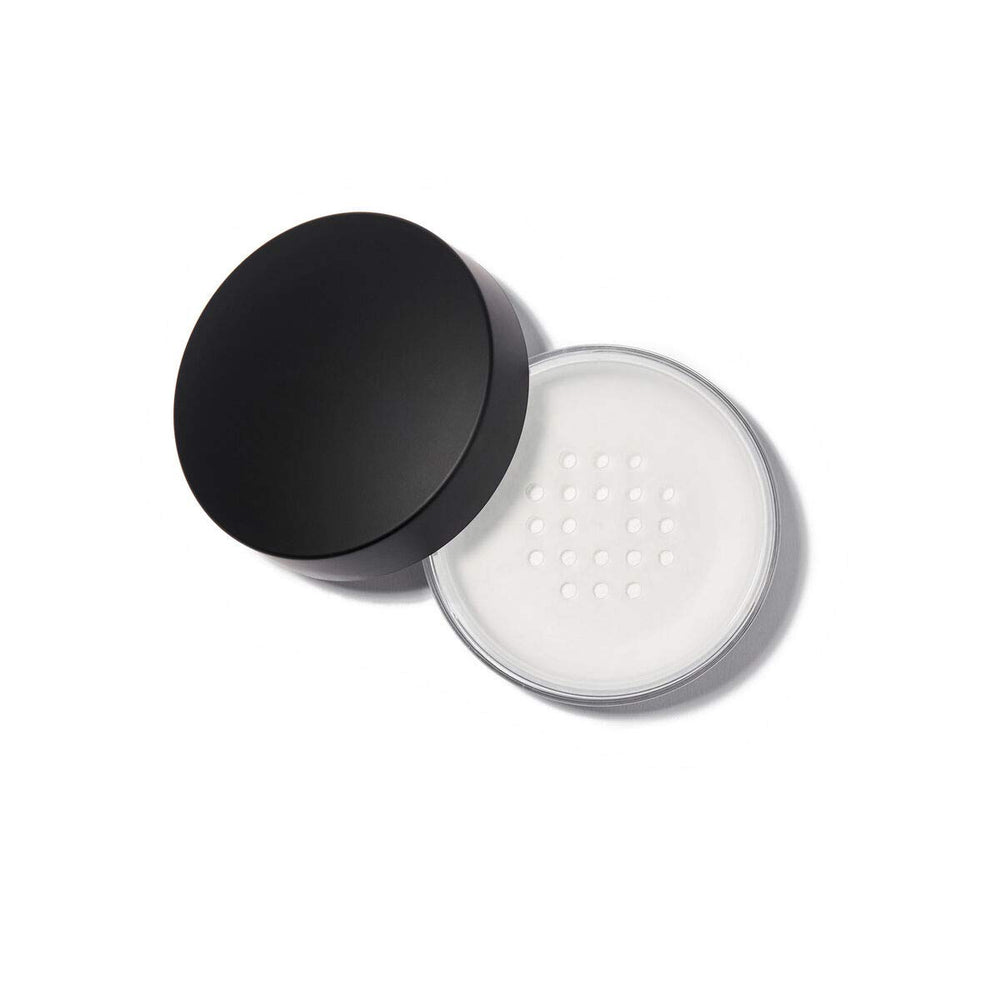 Anastasia Beverly Hills translucent powder being brushed for seamless blend and long-lasting hold.