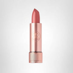 Anastasia Beverly Hills Satin Lipstick Dusty Rose swatch on skin offering rich, long-lasting color.