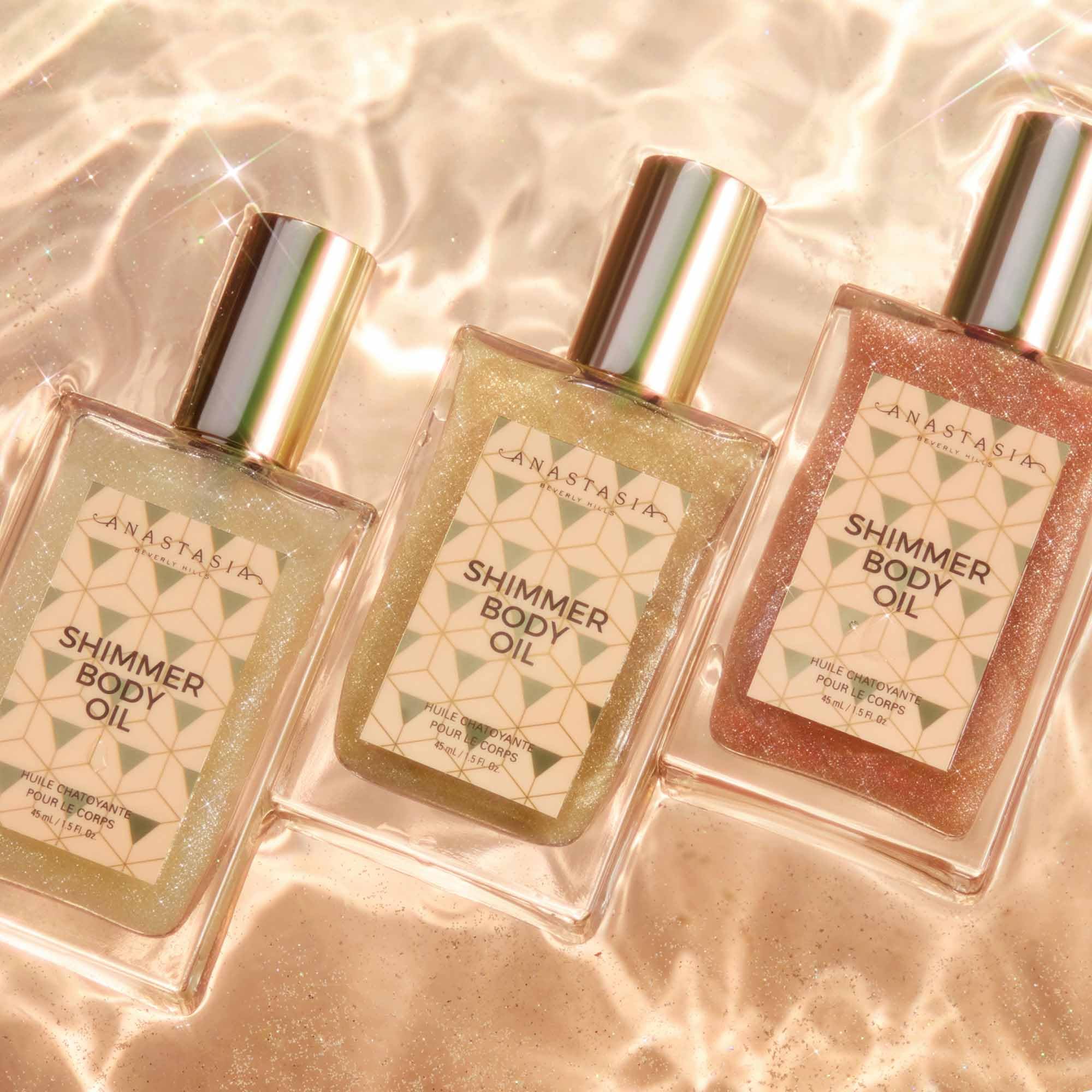 Anastasia Beverly Hills Shimmer Body Oil Gold glow visible on arm