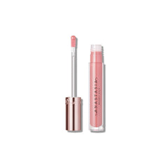 Anastasia Beverly Hills Sun Baked Pink lip gloss tube close-up with sheer shine