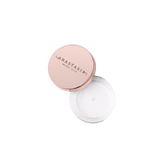 Anastasia Brow Freeze clear wax formula highlighted on skin swatch