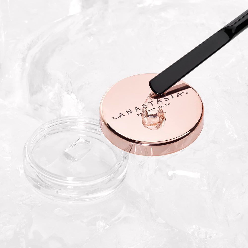 Anastasia Beverly Hills Brow Freeze precision application with flat spatula.