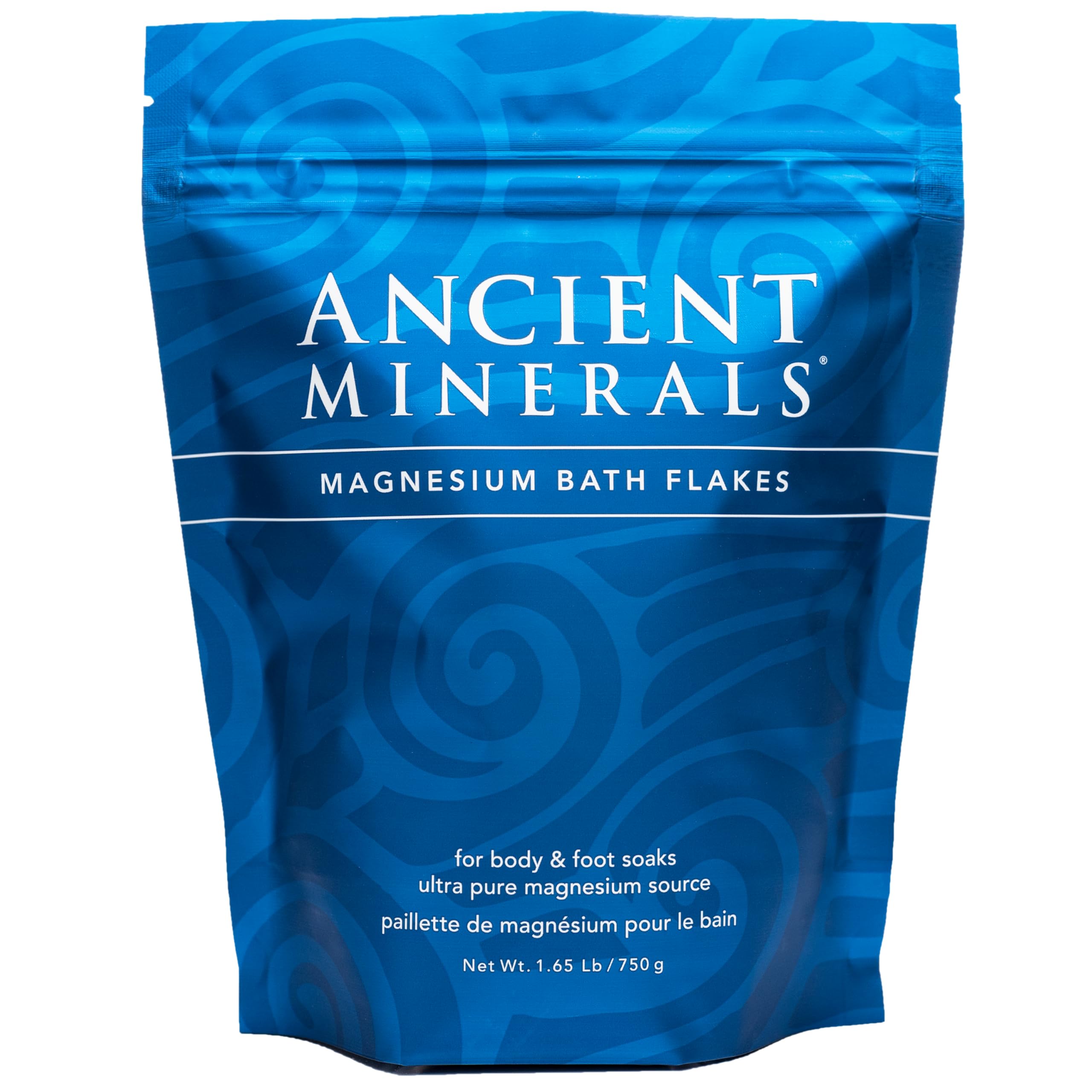 Ancient Minerals magnesium bath flakes bottle closeup for quick topical use.