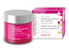 Andalou Naturals 1000 Roses Day Cream jar closeup showing silky texture for smoother skin.